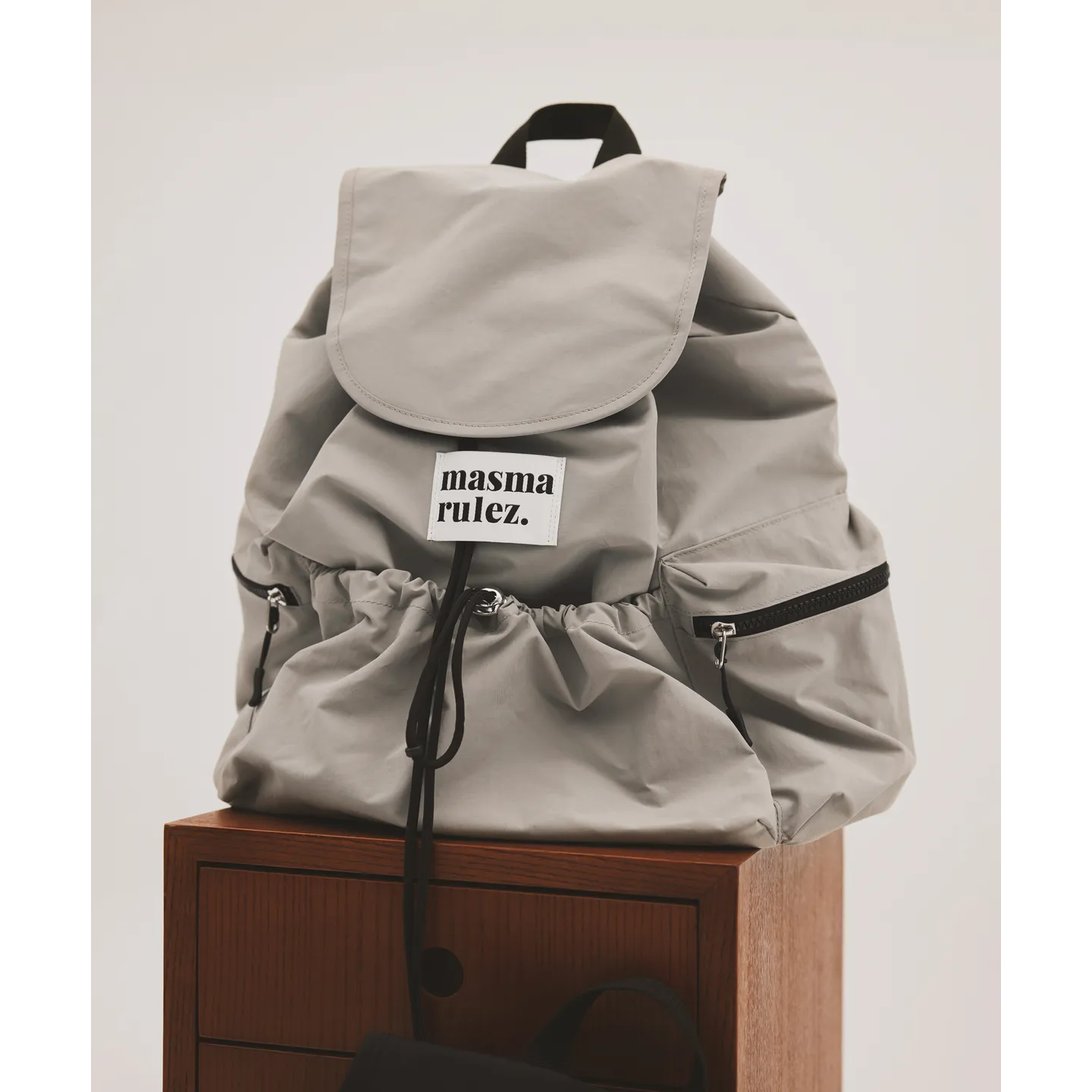 String Flap Backpack