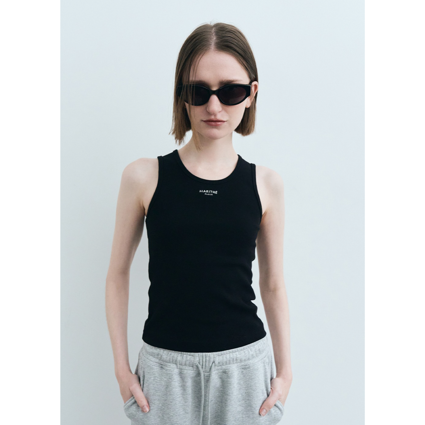W U NECK SLEEVELESS